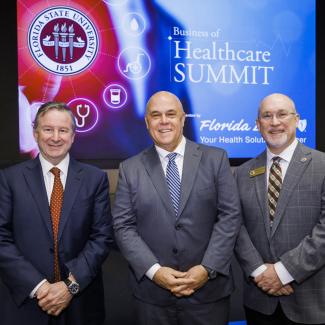 FSU President Richard McCullough, Florida Blue CEO Pat Geraghty and FSU College of Business Dean Michael Hartline